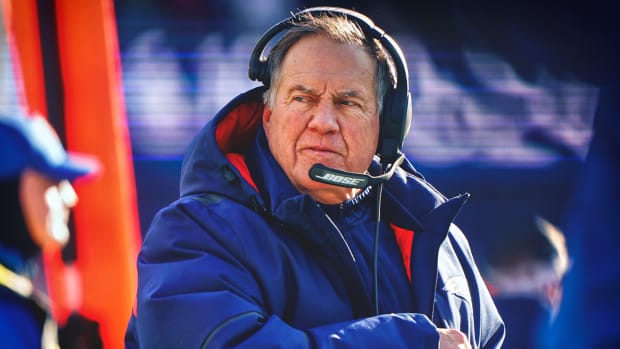 Bill Belichick on the sideline wearing a winter coat